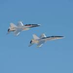 Two jets flying in tight formation.