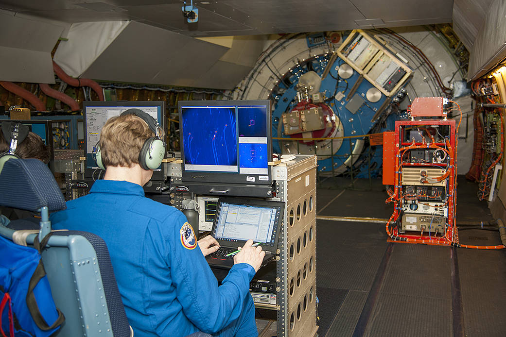 Senior Scientist at SOFIA Science Center, conducting observations onboard SOFIA facing the telescope’s Naysmith foci “eyepiece.” 