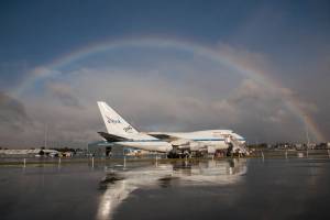The NASA-DLR Stratospheric Observatory for Infrared Astronomy 747SP is framed by a spectacular rainbow following a winter storm