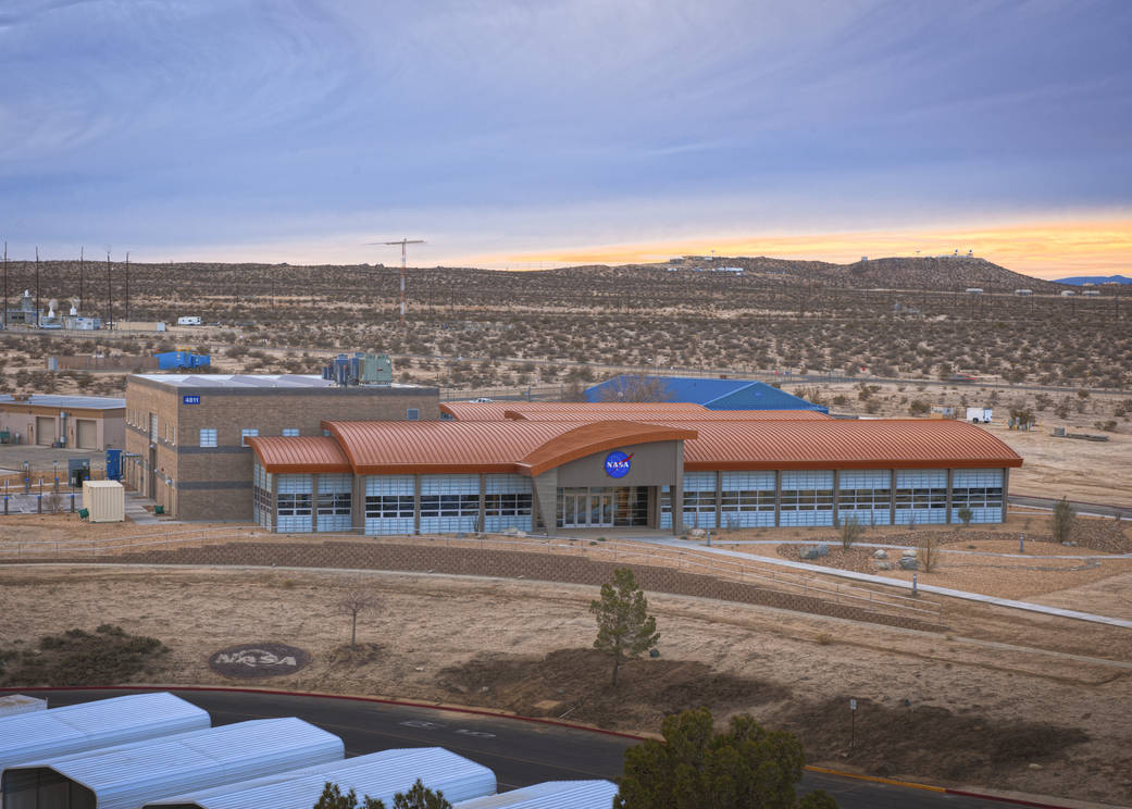 Large expanses of windows and curved rooflines highlight the front of the new Facilities Support Center at NASA's Dryden Flight 