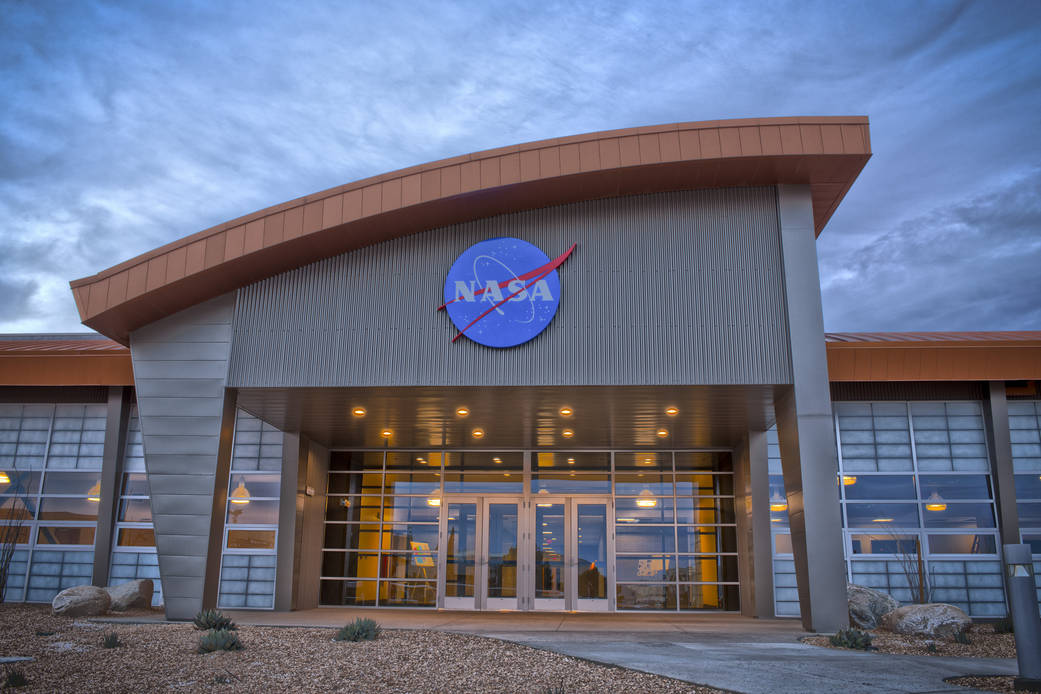 LED lighting provides a soft orange glow at the front entrance of the new Facilities Support Center at NASA's Dryden Flight Rese