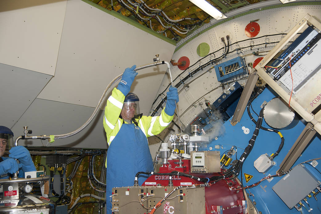 Ground Support Engineer Greg Perryman services the FORCAST instrument.