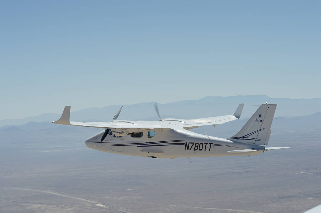 Italian-built Tecnam P2006T in flight.