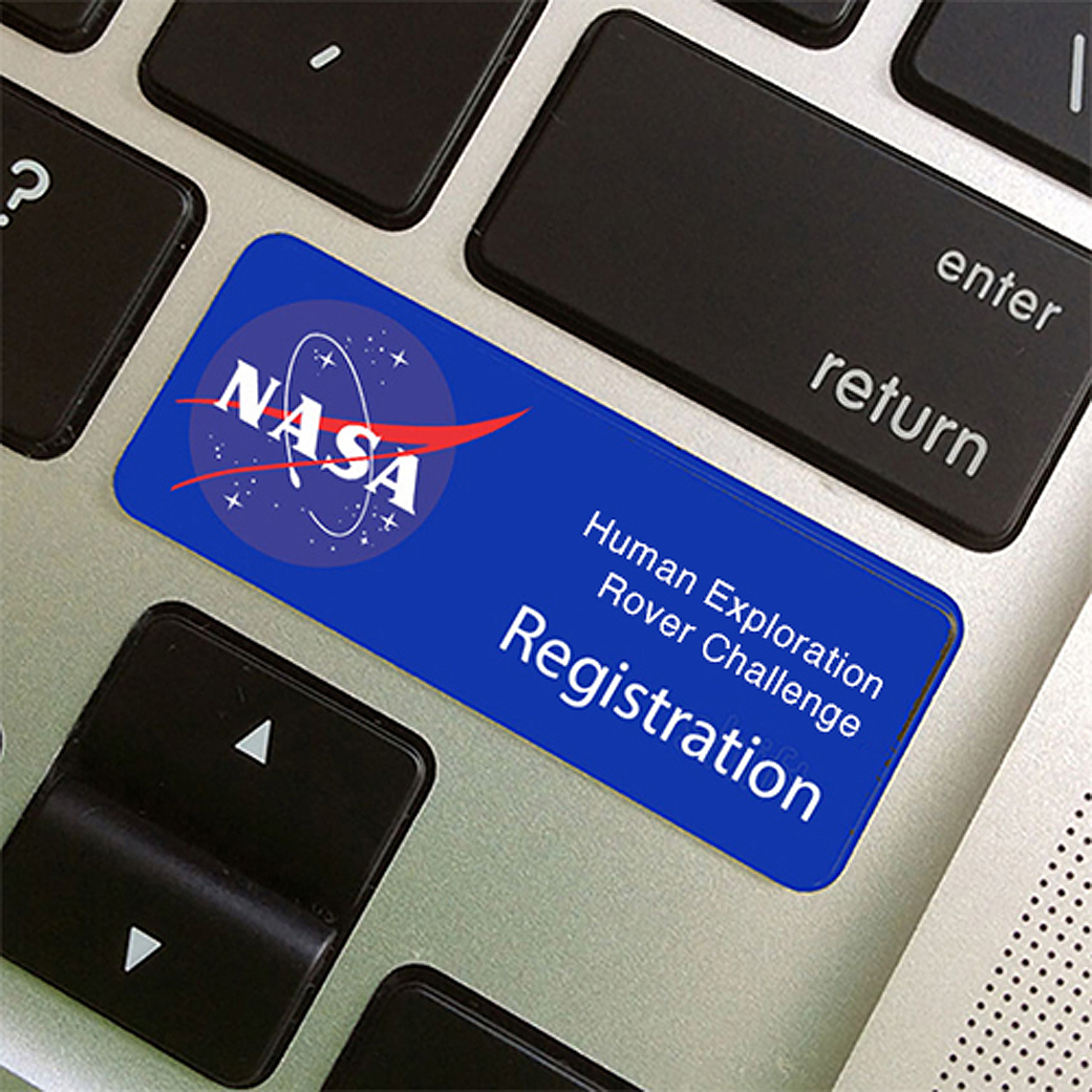 laptop keyboard with Human Exploration Rover Challenge sticker.