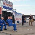 NASA leaders greet the DM-2 crew at Elligton Field Joint Reserve Base in Houston on Aug. 2, 2020.