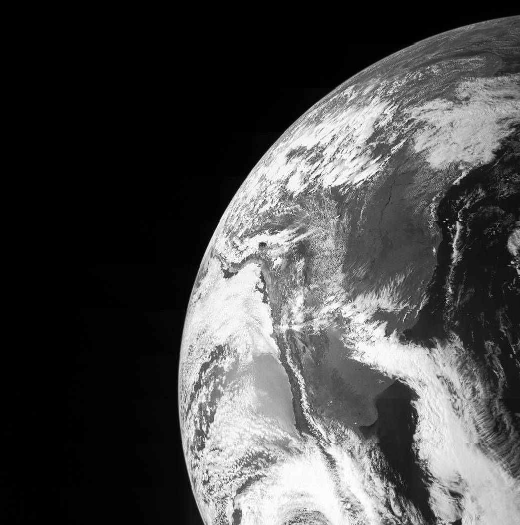 Black and white arc of Earth from orbit
