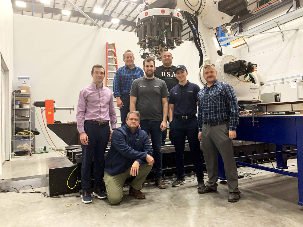 Group photo of the Electroimpact team.