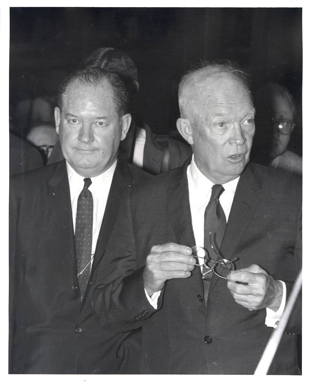 President Dwight D. Eisenhower (right) standing with NASA Administrator T. Keith Glennan (left) during a tour of Marshall. 
