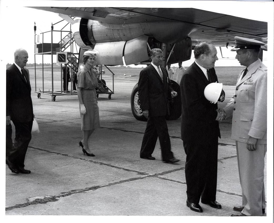 President Dwight D. Eisenhower (left) arriving at Redstone Arsenal for the dedication of Marshall Space Flight Center. 