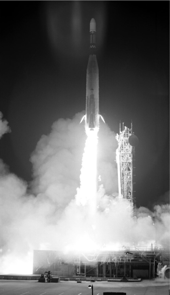 Rocket launch at night.