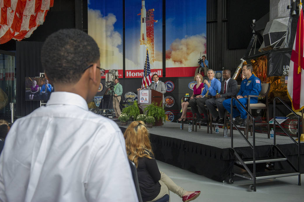 Secretary of Education Arne Duncan, along with NASA astronaut Ricky Arnold and other guests, answer student questions during an 