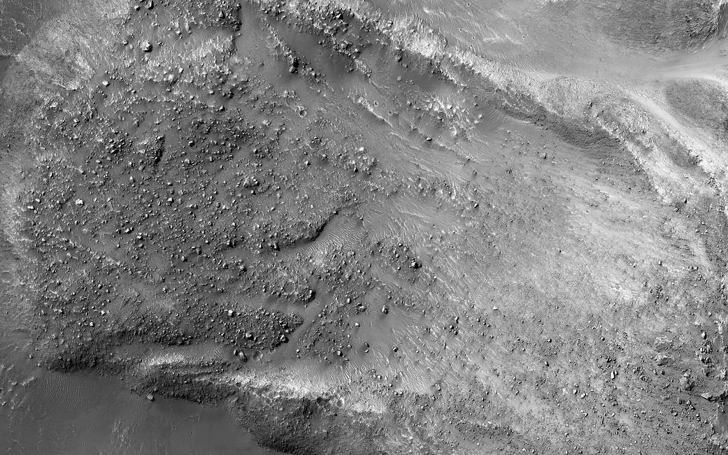 Rocky Mars terrain with canyon wall near top