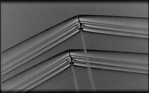 A pair of T-38 aircraft creating shockwaves during supersonic flight.