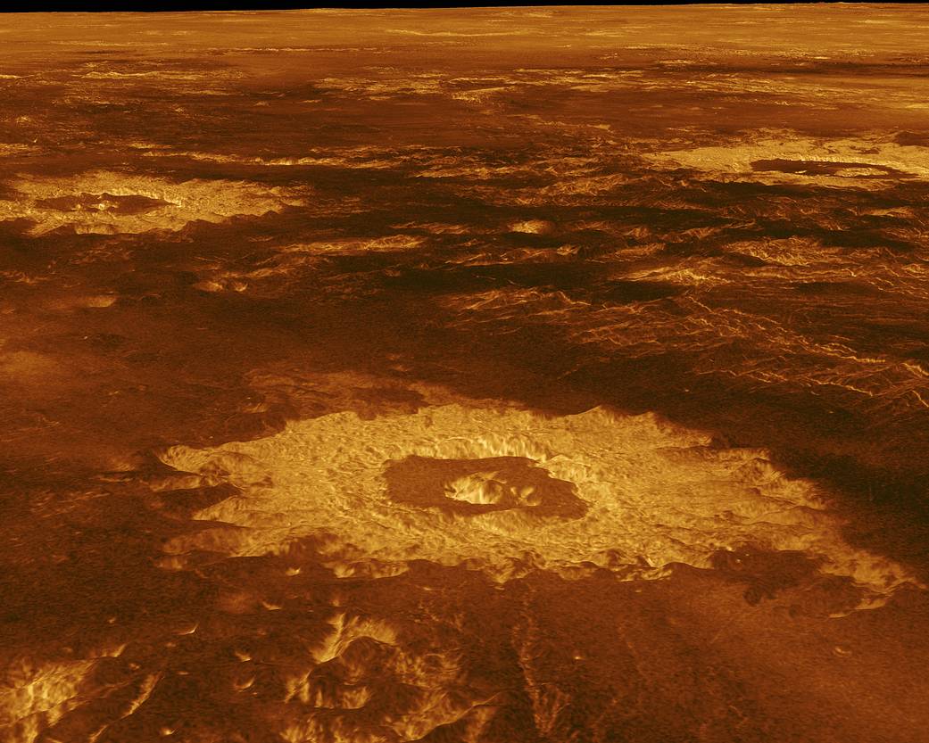 Three impact craters are displayed in this three-dimensional perspective view of Venus' surface. The center of the image is located at approximately 27 degrees south latitude, 339 degrees east longitude in the northwestern portion of Lavinia Planitia.