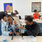 MUREP PSI students constructing a drone during Fayetteville State University’s 2022 summer residential experience.