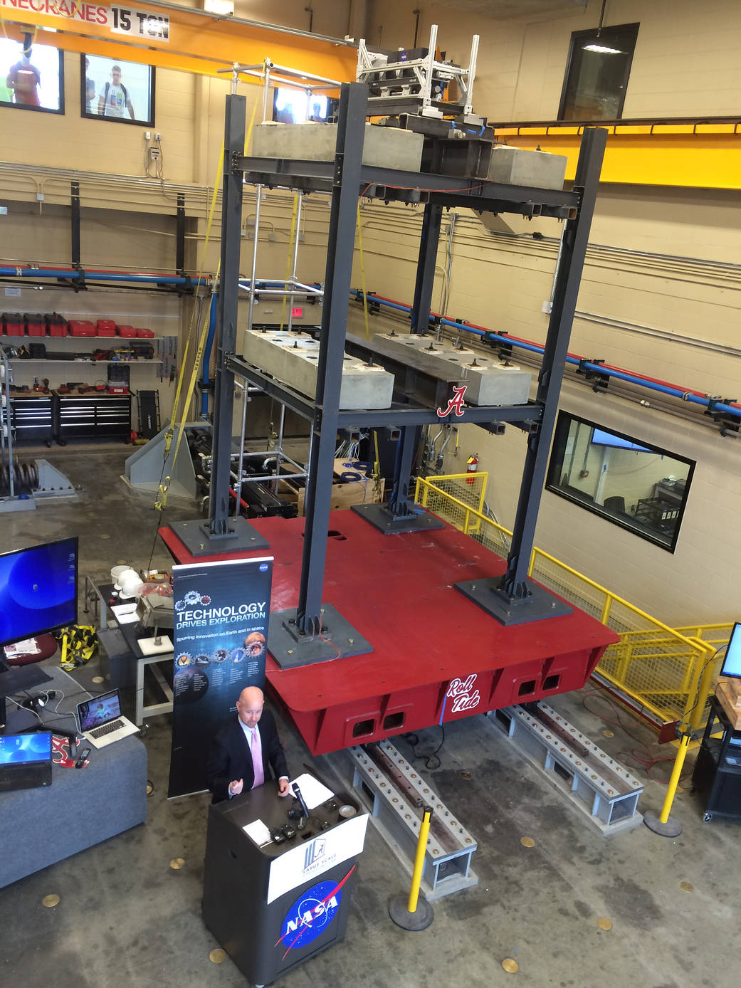 Rob Berry addresses media before tests at the Large Scale Structures Laboratory at the University of Alabama in Tuscaloosa.