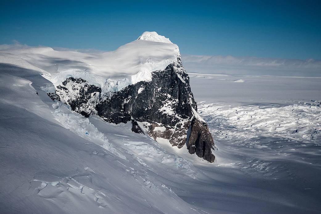 A rock outcrop and ice near Antarctica’s Fleming Glacier seen during the Nov. 16, 2014, IceBridge survey flight.