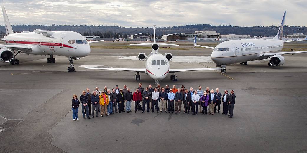 ATD-1 team posing in front of 3 aircraft.