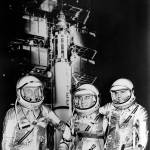 Freedom 7 crew of John Glen, Gus Grissom, and Alan Shepard in their space suits in front of the Redstone rocket.