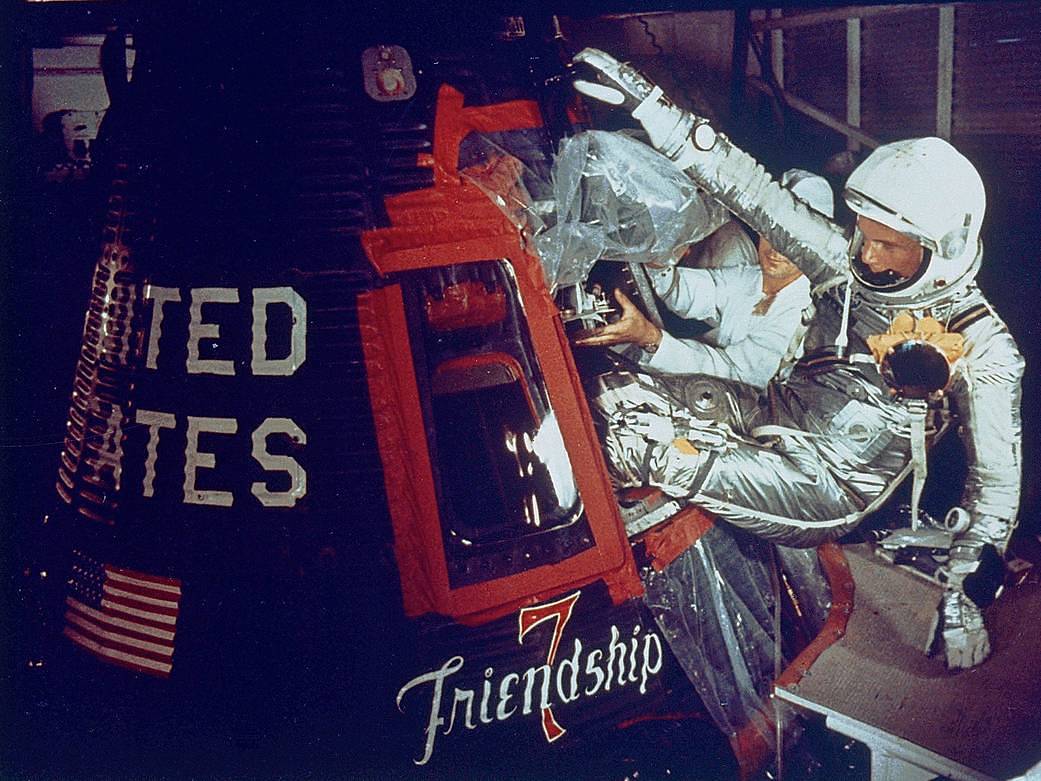 Astronaut John Glenn enters the Mercury spacecraft, Friendship 7, prior to the launch of Mercury-Atlas 6 (MA-6) on Feb. 20, 1962.