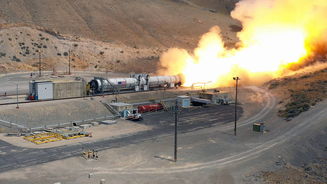 A single solid rocket booster motor fires up at Northrop Grumman’s test facility in Promontory, Utah, on July 21. 