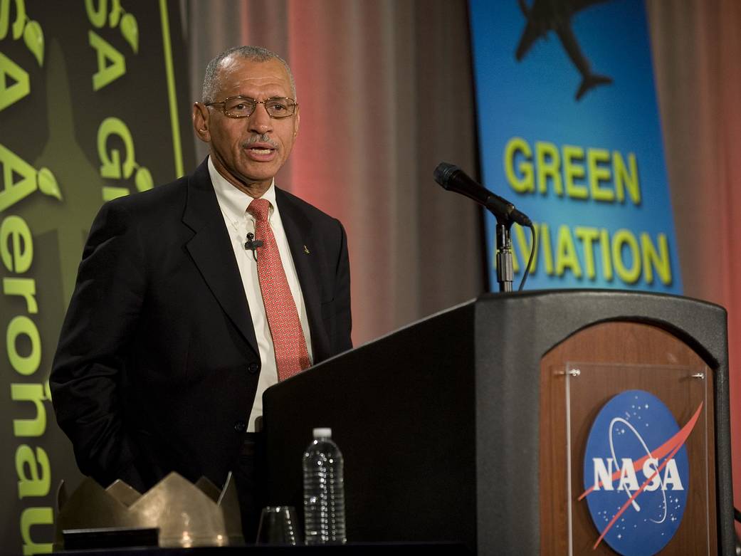 NASA Adminstrator Charles F. Bolden speaking at a podium on the opening day of the Green Aviation Summit, hosted September 8-9, 2010.