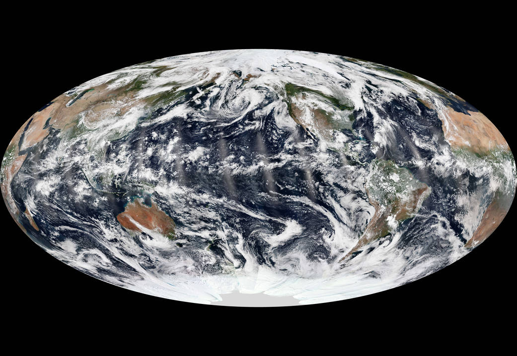 Composite of fourteen polar satellite passes, or swaths, stitched together from September 8, 2013. The natural-color images were