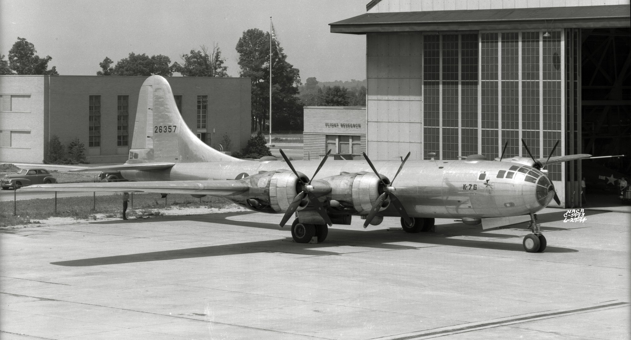 B-29 bomber on tarmac.