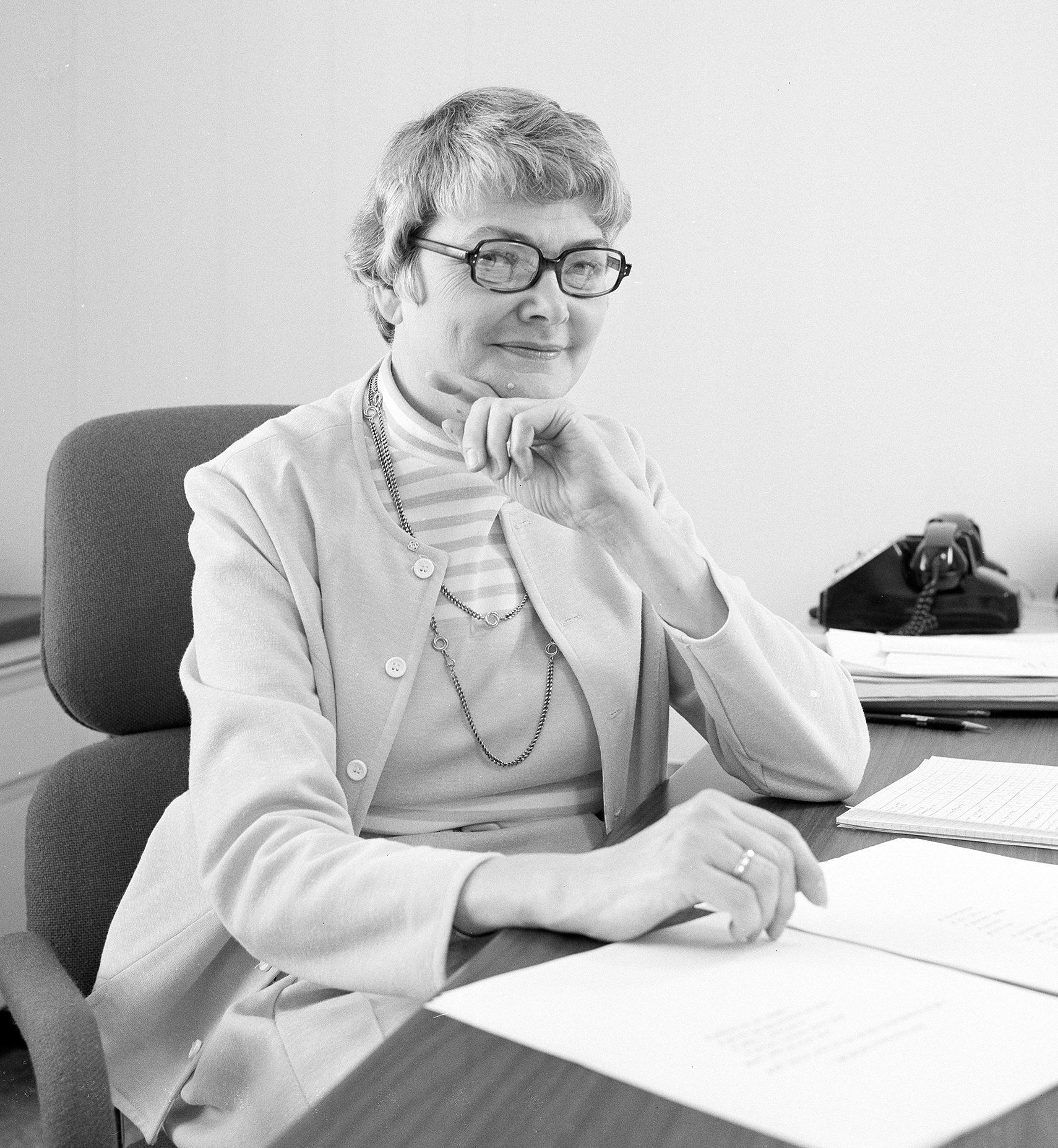 Peggy Yohner at desk.