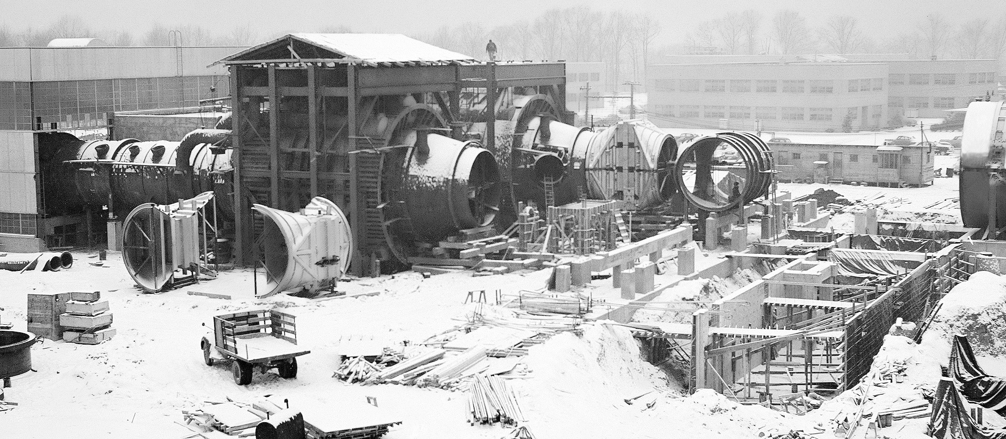 Snow covered facility construction site.