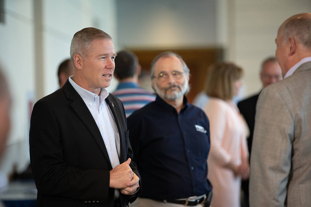 IV&V Facility Renaming Employees at Social Event 