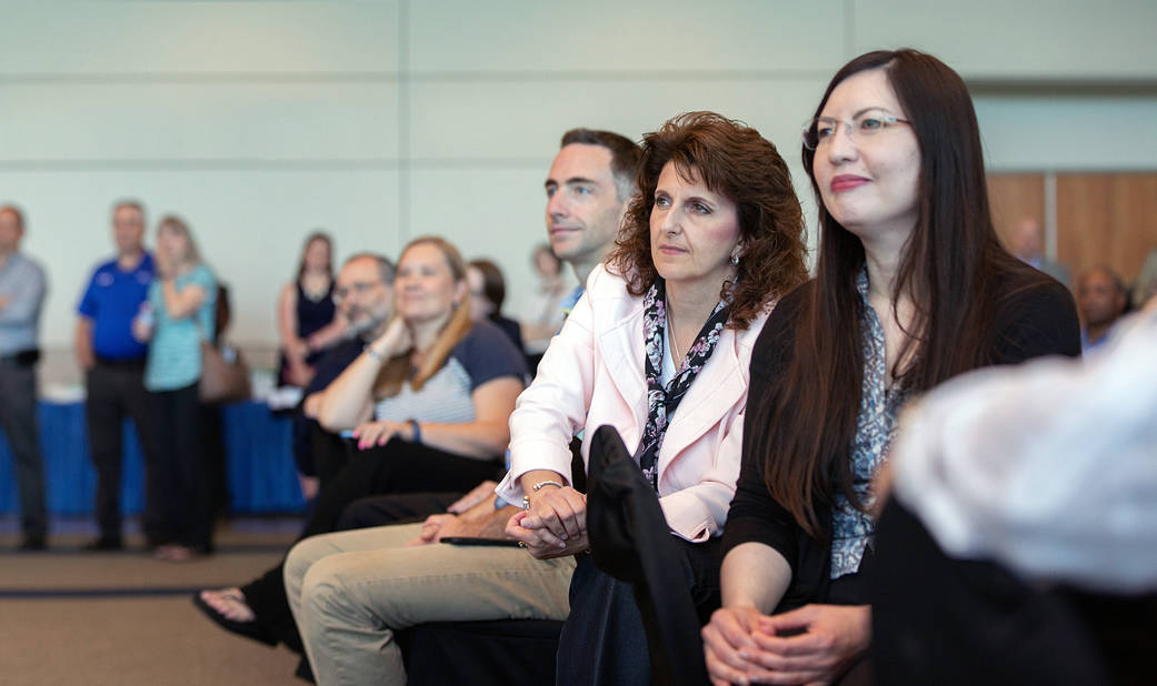IV&V Facility Renaming Employees at Social Event 