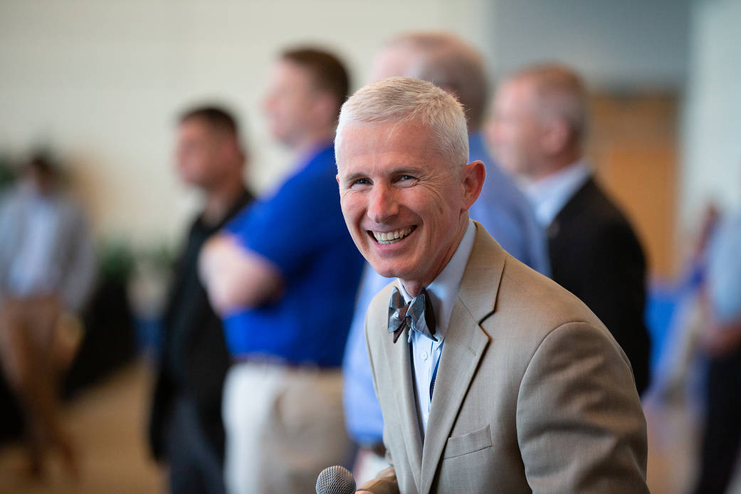 IV&V Facility Renaming Employees at Social Event 