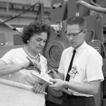 Margaret W. ‘Hap’ Brennecke reviews blueprints with Ernest Bayless in the Manufacturing and Engineering Laboratory.