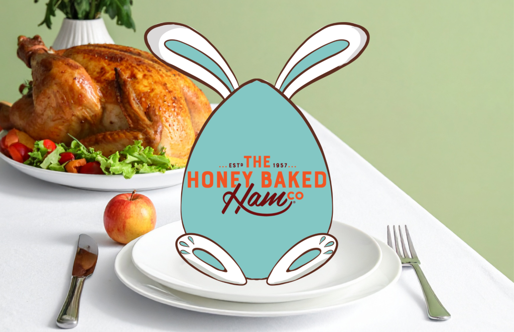 An image of an egg with rabbit ears and feet with the Honey Baked Ham logo in the center.