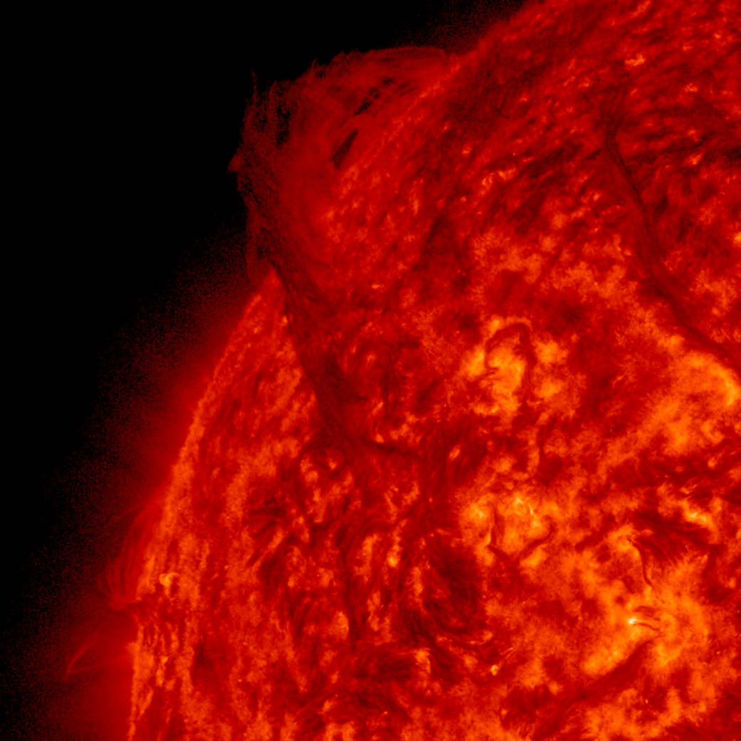 A long prominence suspended above the sun's surface rotated into view this week (May 13-15, 2015).