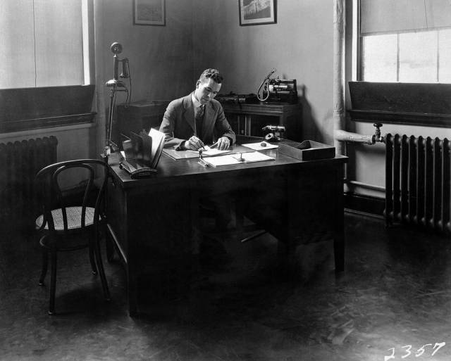 Henry J.E. Reid at his desk, 1928