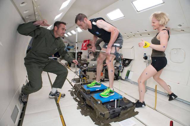 Researchers test hardware during a parabolic flight