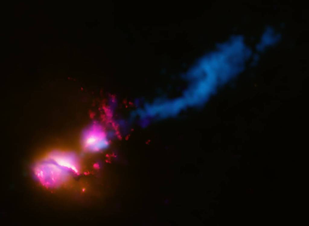 Black Hole Fires at Neighboring Galaxy