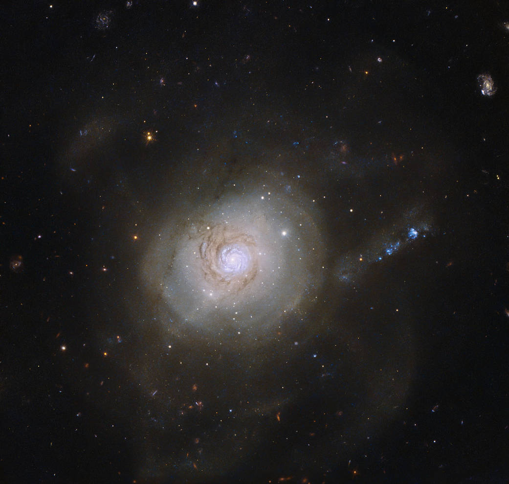 The spiral galaxy NGC 7252 has a superficial resemblance to an atomic nucleus