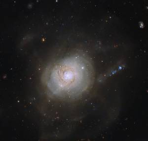 The spiral galaxy NGC 7252 has a superficial resemblance to an atomic nucleus