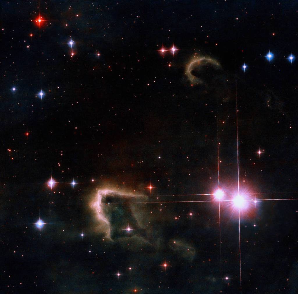 This image shows knots of cold, dense interstellar gas where new stars are forming. These Free-floating Evaporating Gaseous Globules (frEGGs) are located in the Northern Coalsack Nebula in the direction of Cygnus, the Swan.