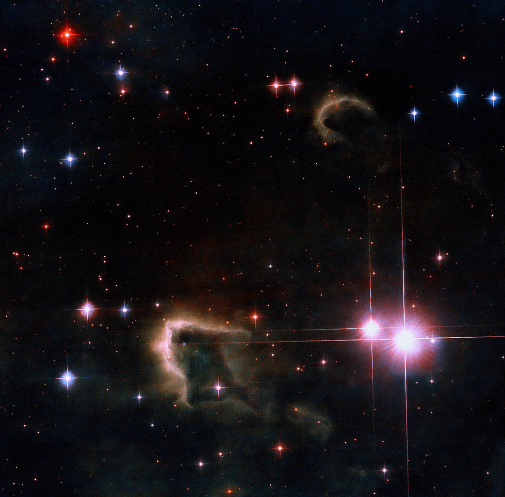 This image shows knots of cold, dense interstellar gas where new stars are forming. These Free-floating Evaporating Gaseous Globules (frEGGs) are located in the Northern Coalsack Nebula in the direction of Cygnus, the Swan.