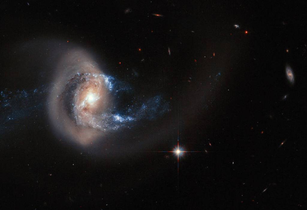 Hubble's photo of NGC 7714 presents an striking view of the galaxy's smoke-ring-like structure.