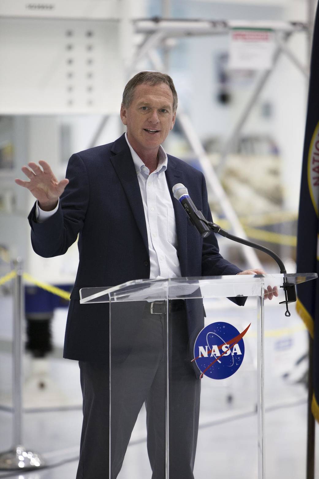 Mike Bolger, EGS Program manager speaks to guests in the Space Station Processing Facility at Kennedy Space Center.
