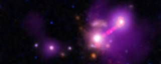 This image features a galaxy called 3C 297 that is lonelier than expected after it likely pulled in and absorbed its former companion galaxies,