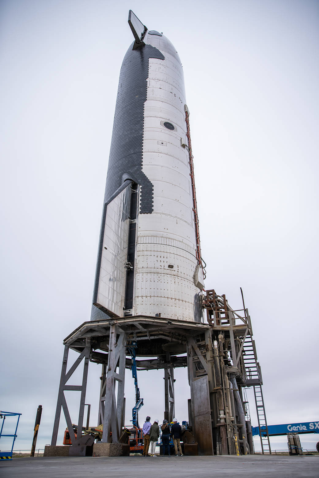 NASA Human Landing System program members view a SpaceX Starship at the company’s facilities in Boca Chica, Texas.