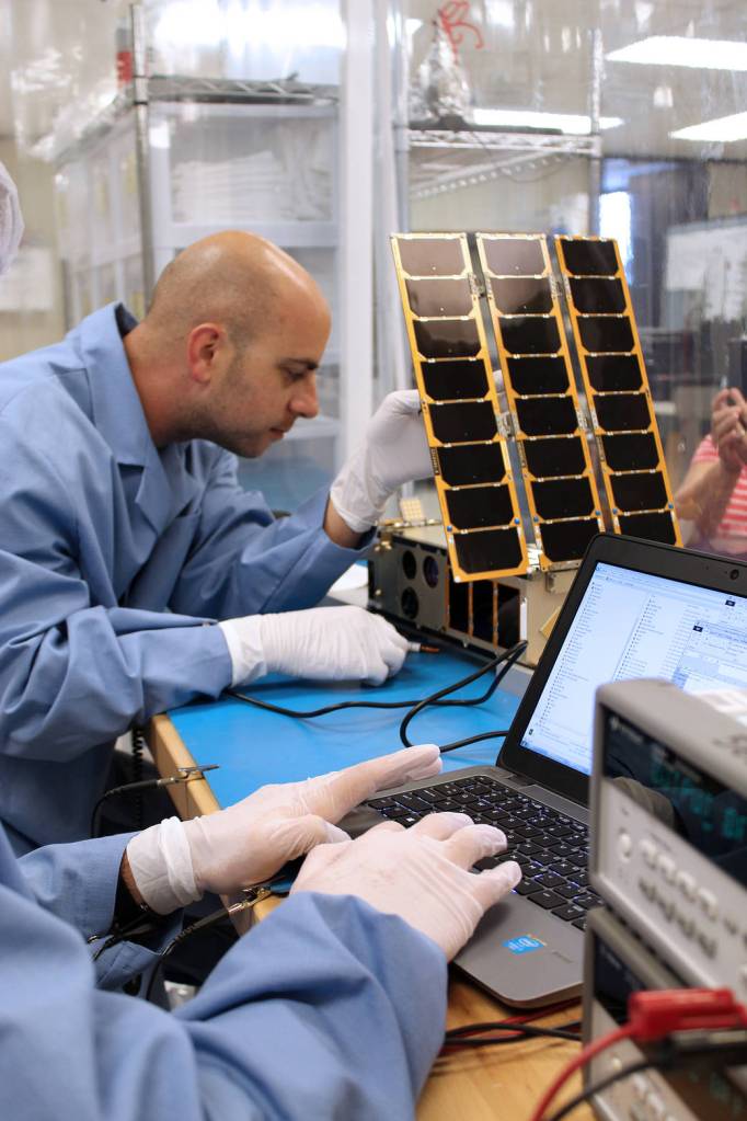 Integrated Solar Array and Reflectarray Antenna (ISARA)