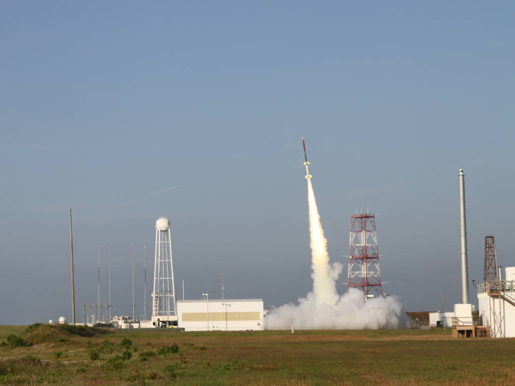 The RockOn sounding rocket clears the tower shortly after lift off.