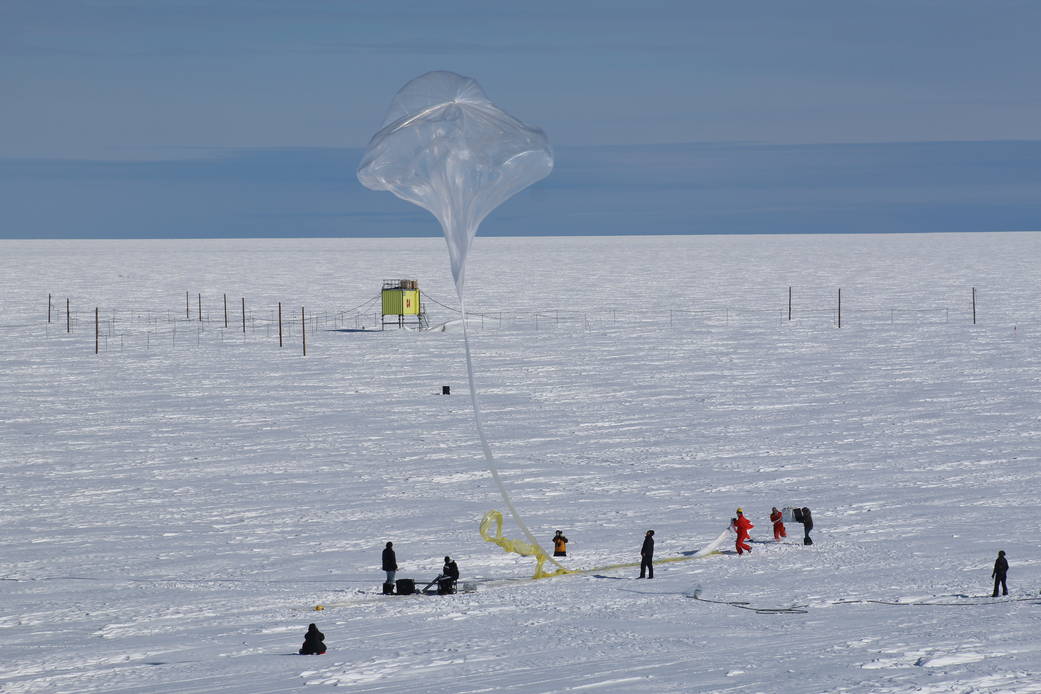 Release of a BARREL balloon. The launch crew can be seen on the right holding the payload as the top of the balloon moves overhe